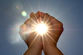 image of hands and sunlight